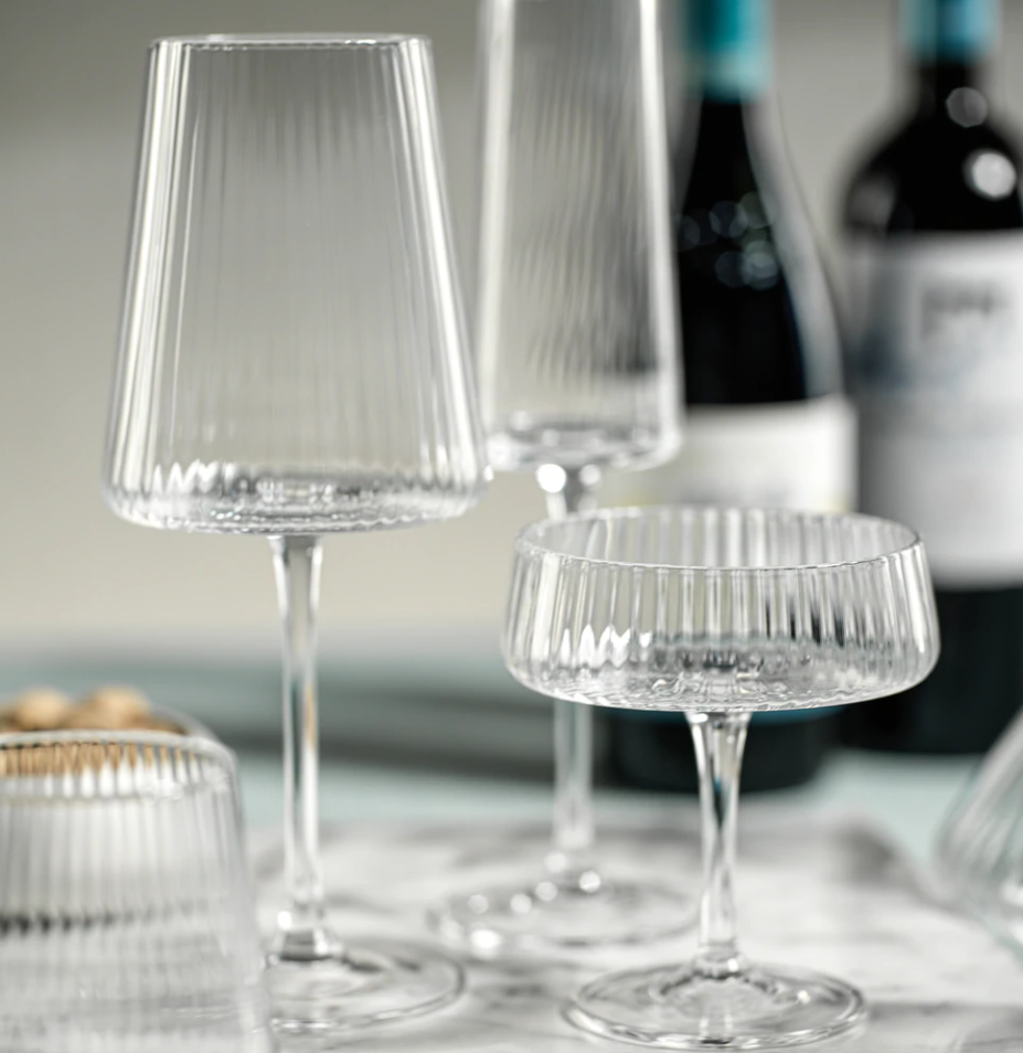 http://shopthreadonline.com/cdn/shop/products/Bandol-Fluted-Textured-Wine-Glass-2_1200x_303c50e1-12bc-42f7-85b8-631891e67900_1200x1200.png?v=1678299576